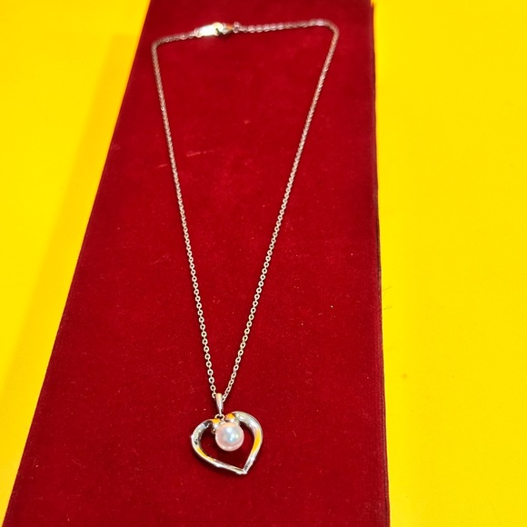 Mikimoto Silver Heart Necklace with Pearl
925 silver made. - Picture 6 of 12